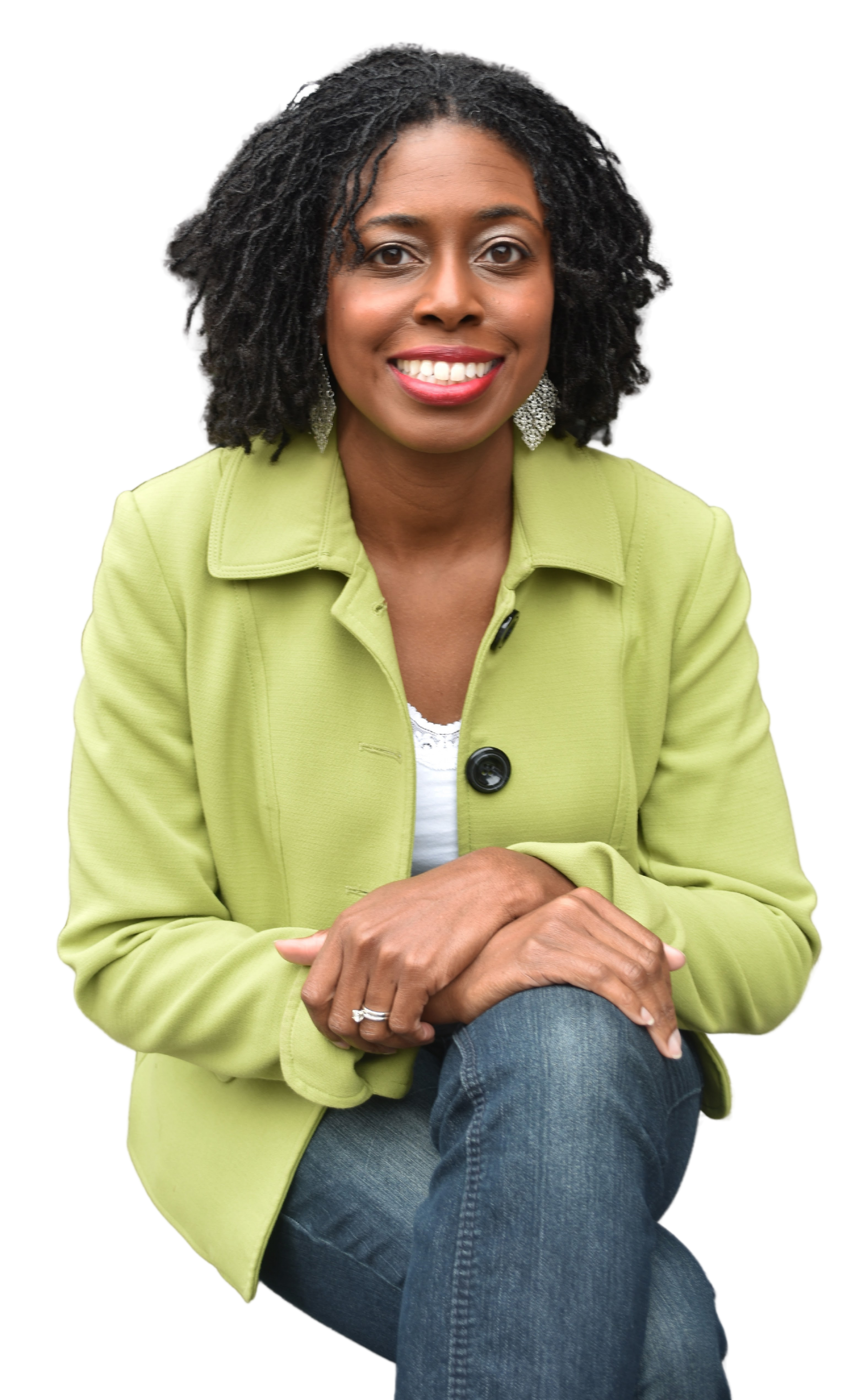 Smiling woman wearing green jacket and jeans
